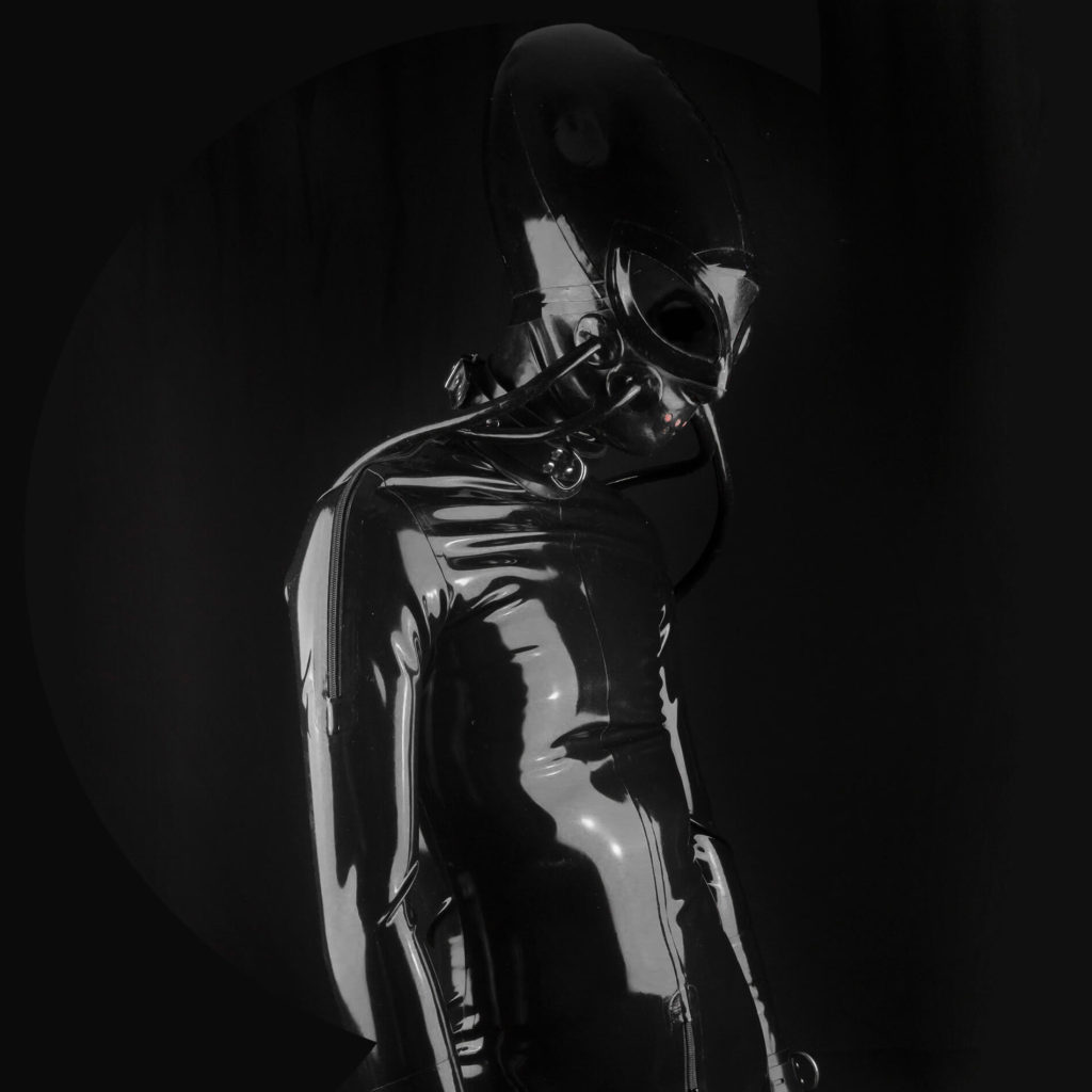 rubber alien with black fetish outfit all made from black rubber
